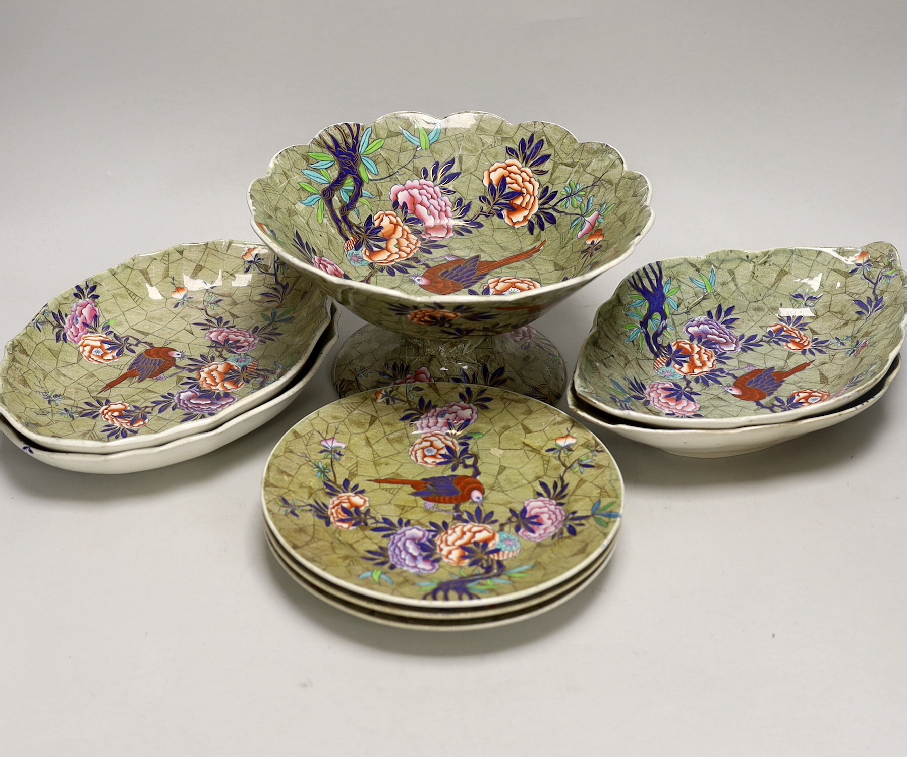 A Spode ‘Tumbledown Dick’ part dessert service, early 19th century, decorated with birds and flowers